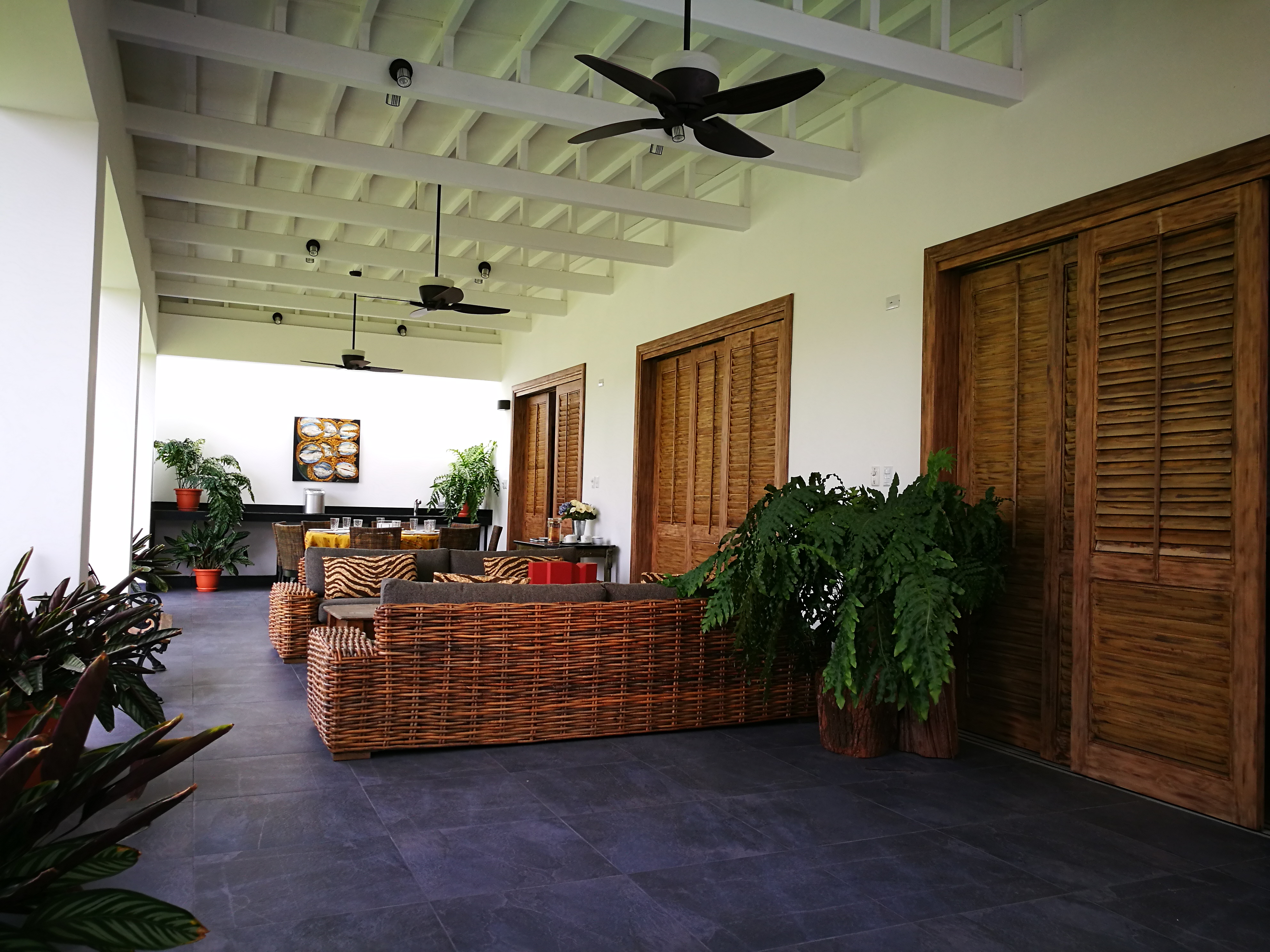Refreshing a home with innovative additions, garage and pergola